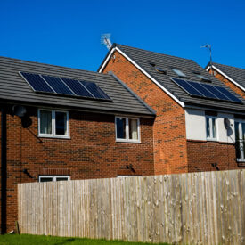 English House with Solar Panels on roof for electisity